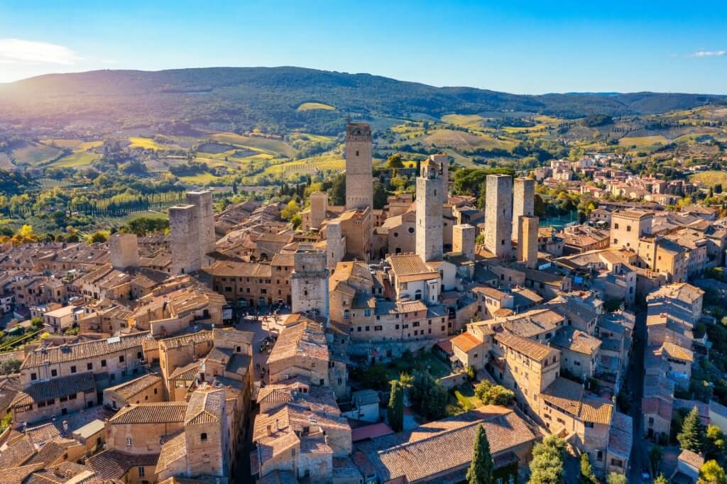 Birds view of the town of San Gimignano while sunset.