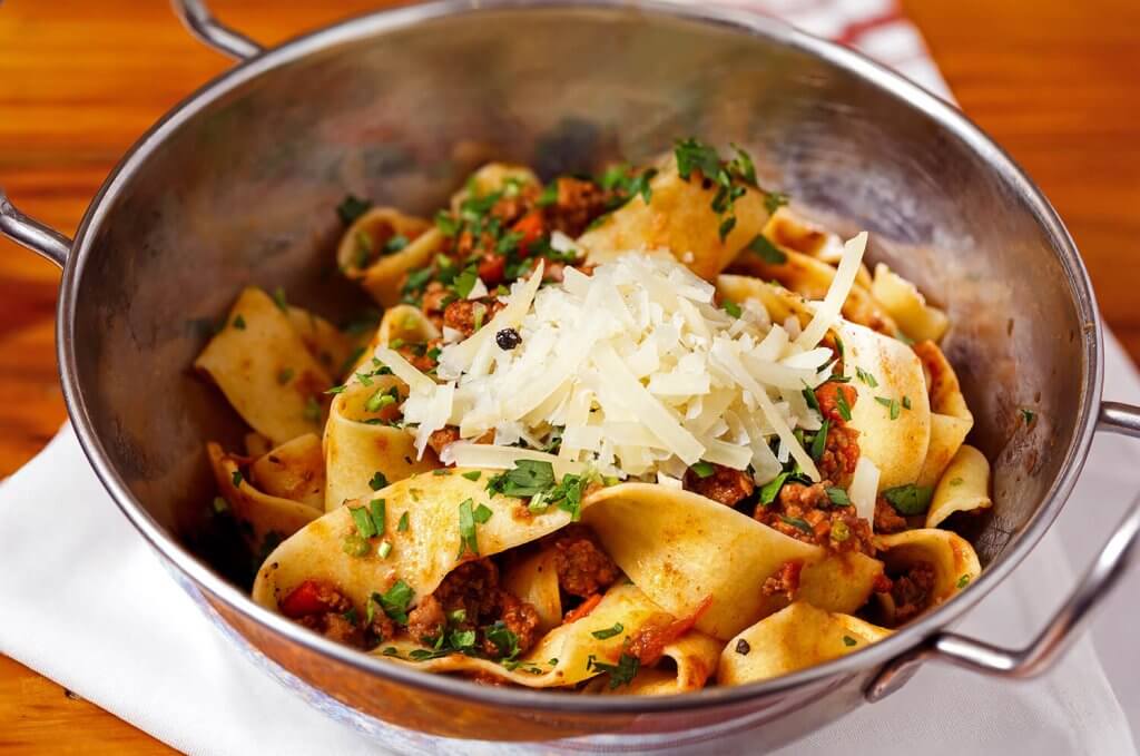 Parpadelle pasta with meat, parsley and parmesan