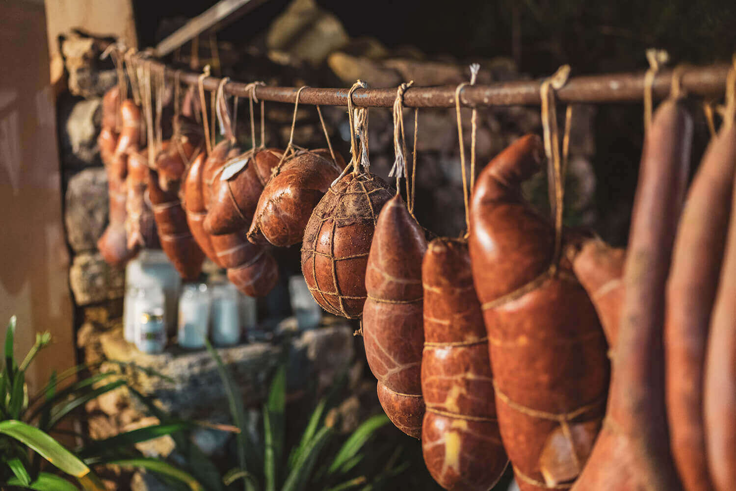 Hanging Sobrasada on a market in Mallorca.