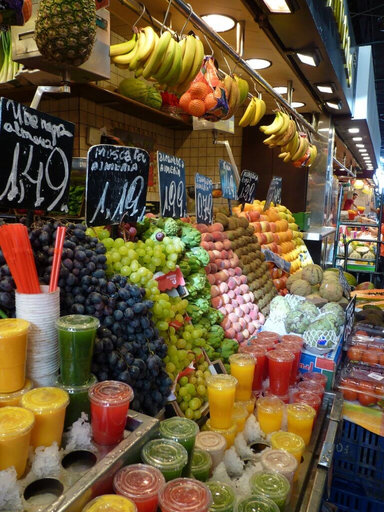 Fruits and smoothies in the Boqueria Market in Barcelona.