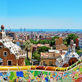 View from the mosaics of Parc Güell to the sea of Barcelona.