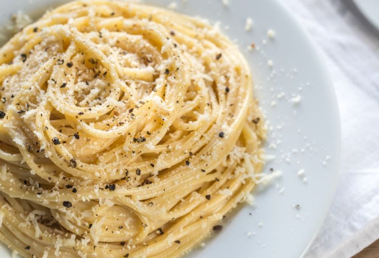 Pasta plate with parmesan and pepper