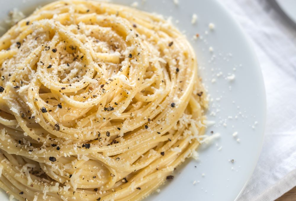 Pasta plate with parmesan and pepper