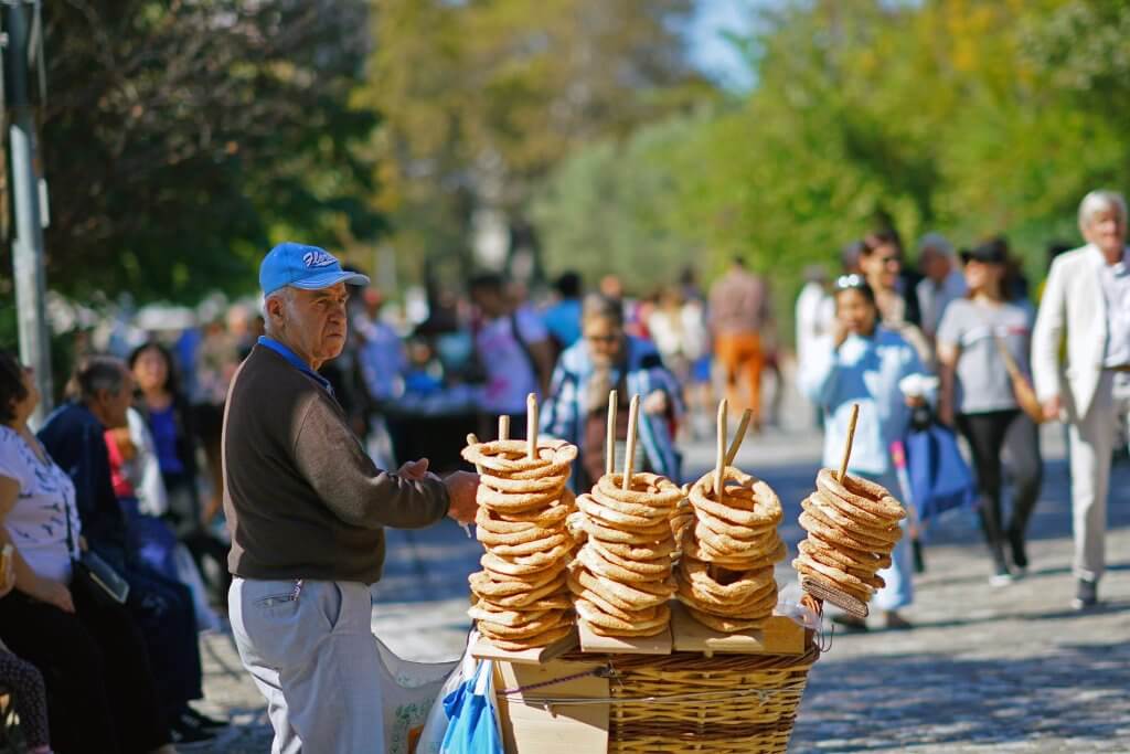 Donut seller, koulourakia, on the street in Athens, in Plaka district