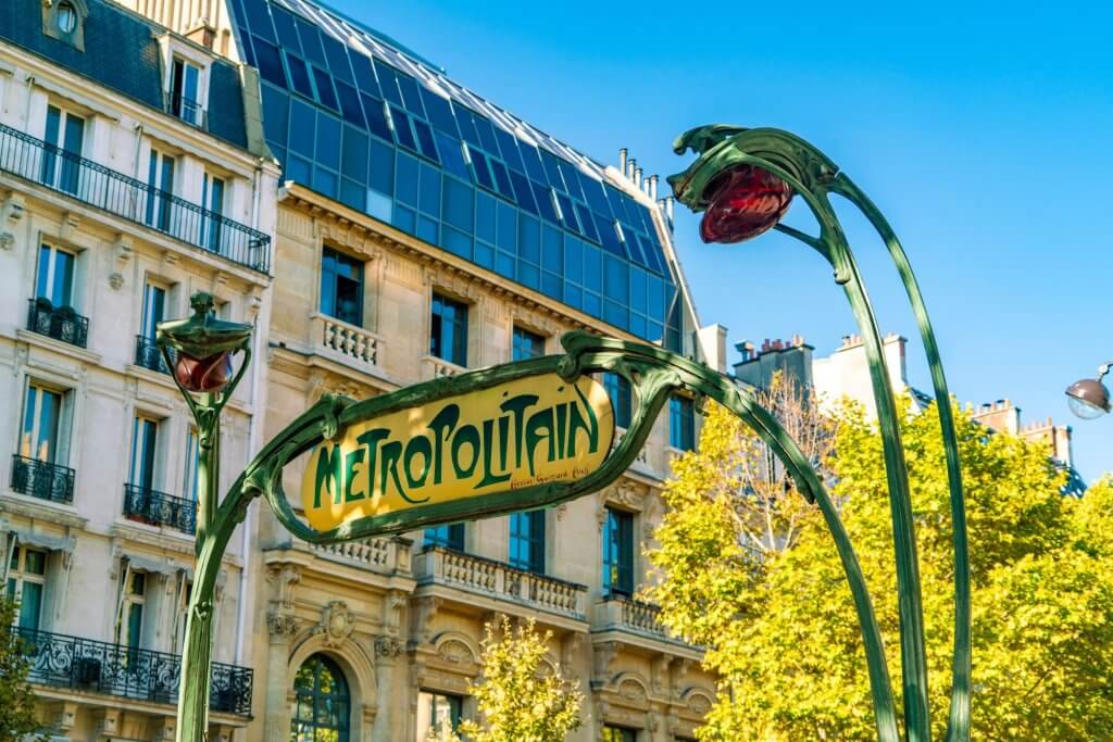 Historic Art Deco entrance subway sign in Paris, France