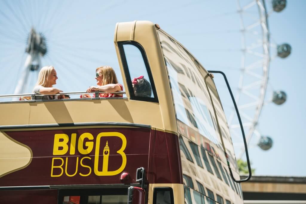 The red Big Bus bus in London on a sunny day.