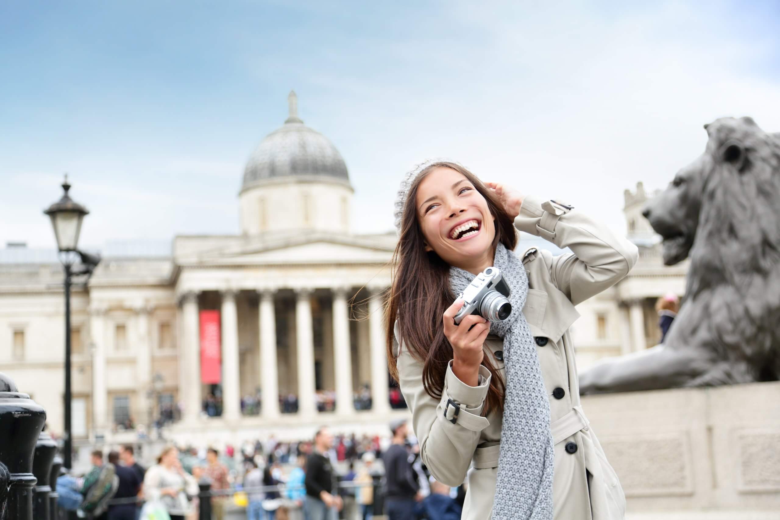 Woman taking a Selfie infront of national Gallery London.