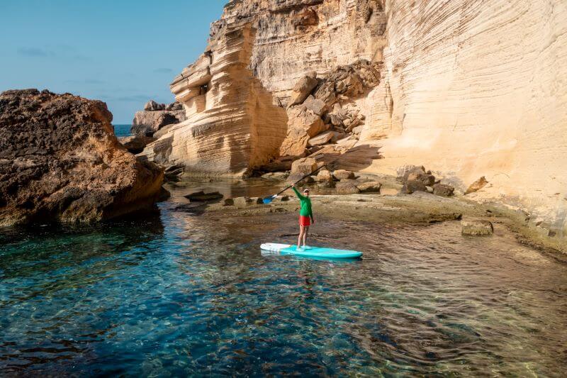 Young woman on SUP at Mallorca