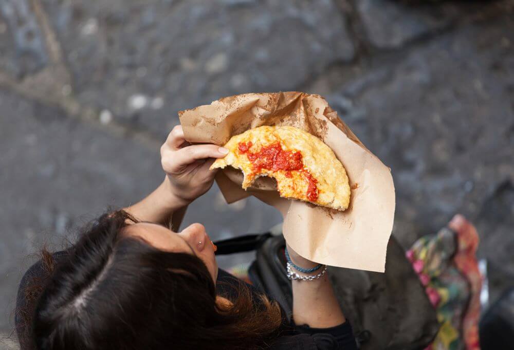 Fried pizza is one of the most popular street foods in Naples